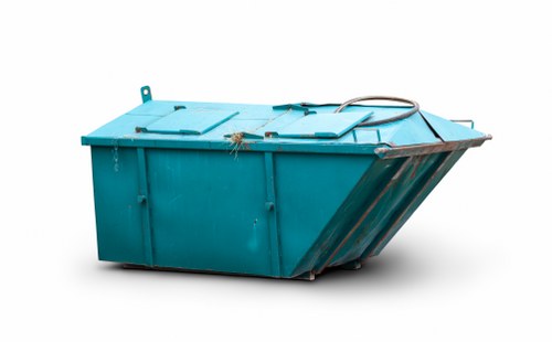 Front view of commercial waste collection vehicle at a business site